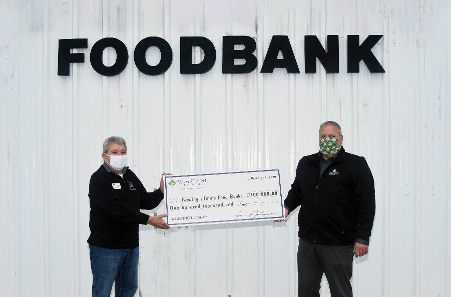 Jim Hires, Feeding Illinois Board Member, (left) and Aaron Johnson, FCI President & CEO, (right)